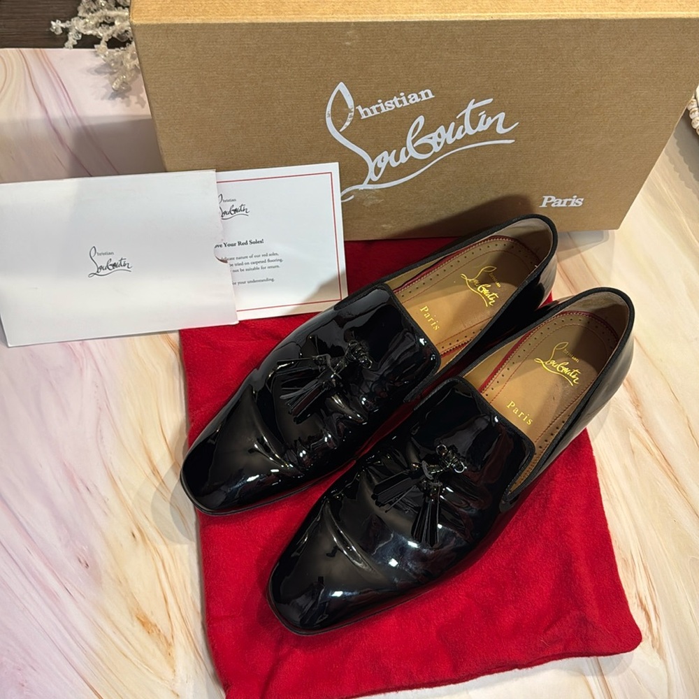 Louboutin men’s loafers. Dandelion tassel flat black